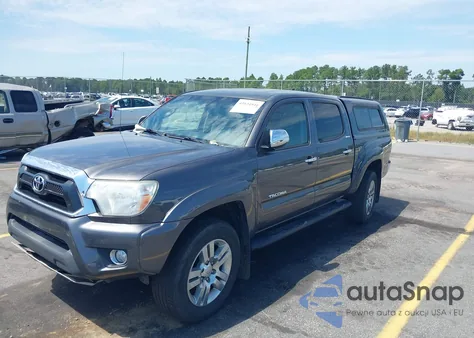 2015 Toyota Tacoma Base V6 z USA, uszkodzony, nr VIN 3TMLU4EN1FM177255